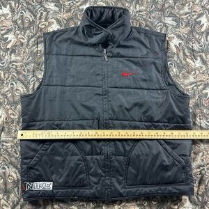 Vintage 90s Nike Men's Black Vest with Red Logo